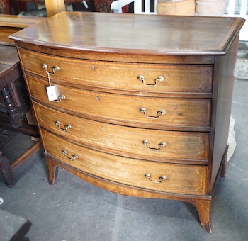 A Regency satinwood banded mahogany bowfront four drawer chest, width 100cm, depth 51cm, height 93cm